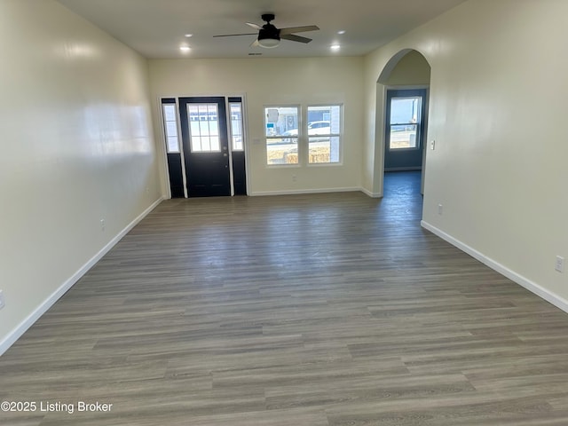 interior space featuring hardwood / wood-style flooring and ceiling fan