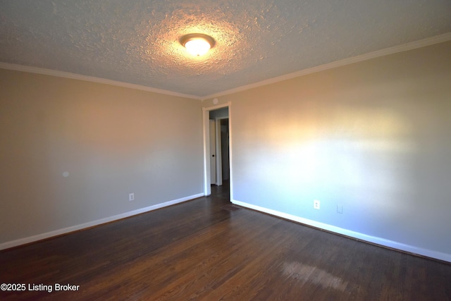 spare room with a textured ceiling, dark hardwood / wood-style flooring, and crown molding