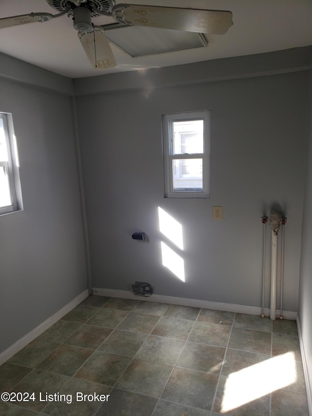 laundry room featuring ceiling fan