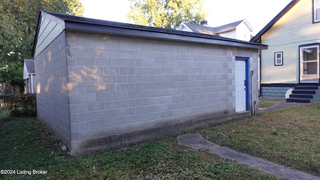 view of home's exterior with a yard