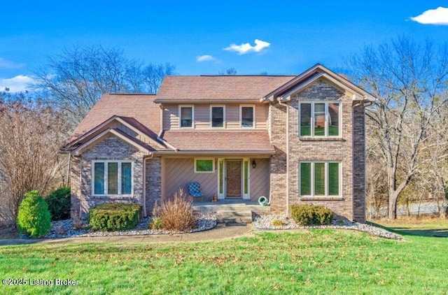 view of property featuring a front yard