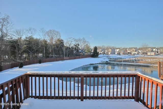 view of snow covered deck