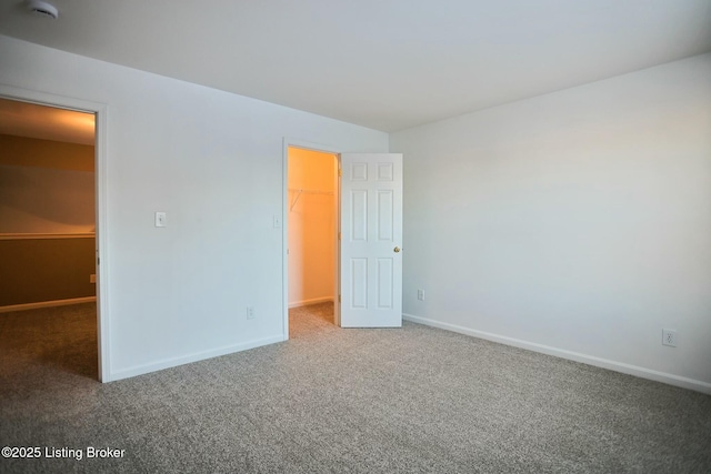 spare room featuring carpet flooring