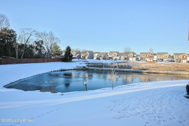 view of yard layered in snow