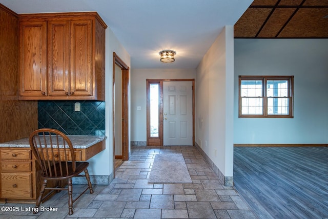 foyer featuring a wealth of natural light