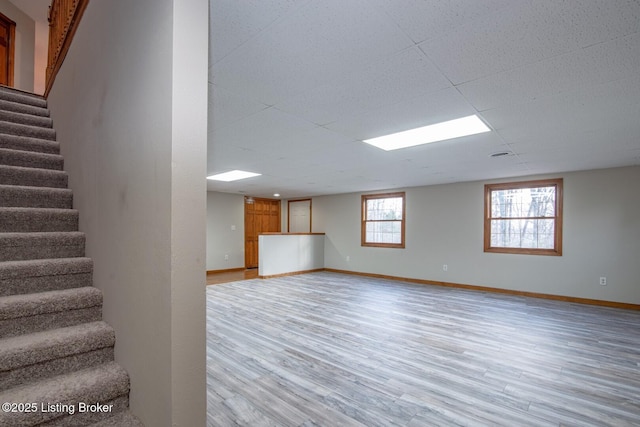 basement with light wood-type flooring