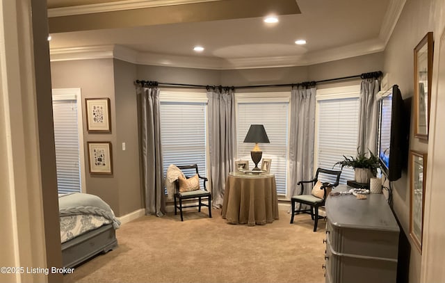 living area featuring ornamental molding and light carpet