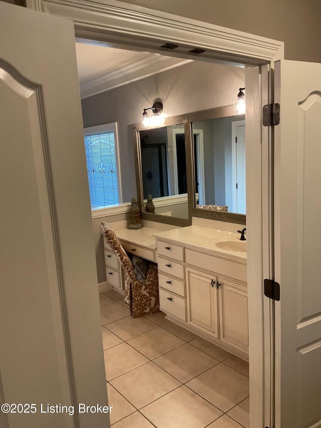 bathroom with vanity, tile patterned floors, and crown molding