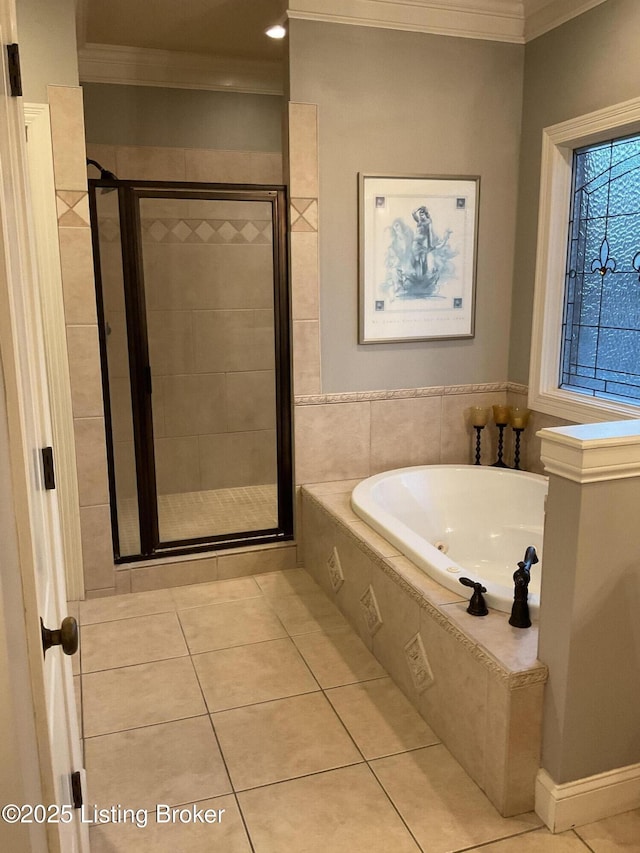 bathroom with independent shower and bath, crown molding, and tile patterned flooring