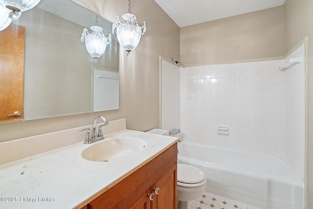 full bathroom with vanity, bathtub / shower combination, and toilet