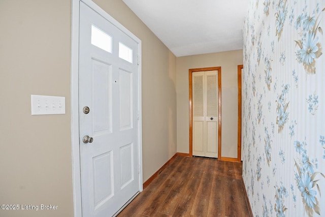 entryway with dark wood-type flooring