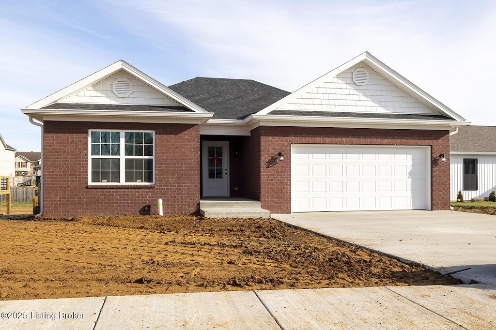 view of front of home featuring a garage