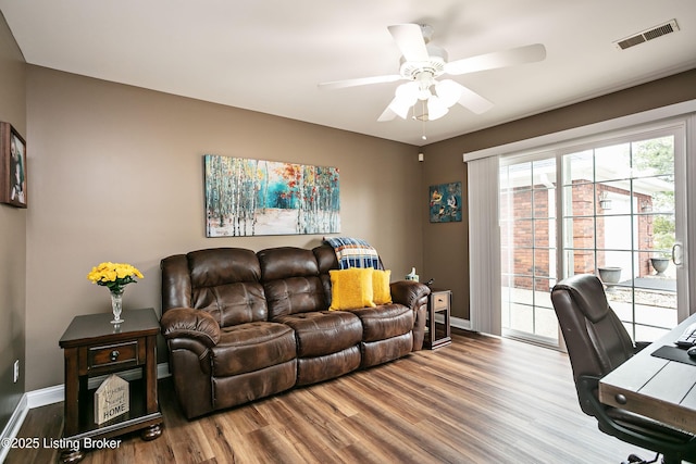 office area with hardwood / wood-style flooring and ceiling fan