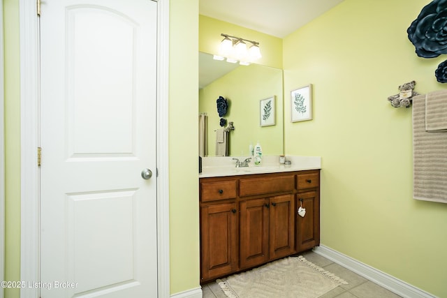 bathroom with vanity and tile patterned flooring