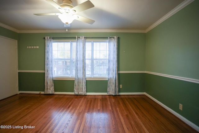 unfurnished room featuring wood-type flooring, ceiling fan, and crown molding