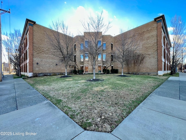 exterior space with a front yard