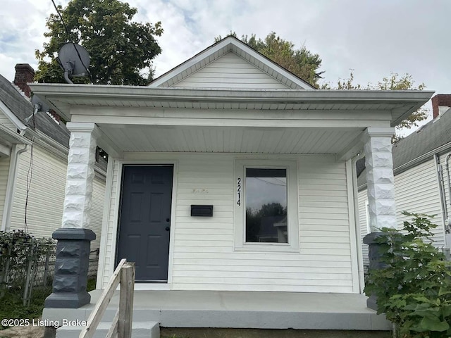 doorway to property featuring a porch