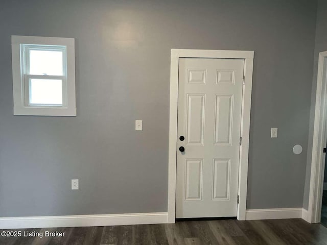 interior space featuring dark wood-type flooring