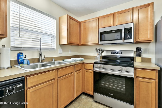 kitchen featuring sink and appliances with stainless steel finishes