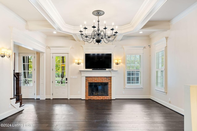 unfurnished living room with beam ceiling, dark wood-type flooring, crown molding, a chandelier, and a fireplace