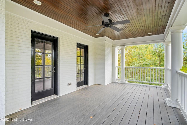 wooden deck featuring ceiling fan and a porch