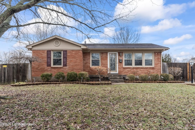 ranch-style house with a front yard