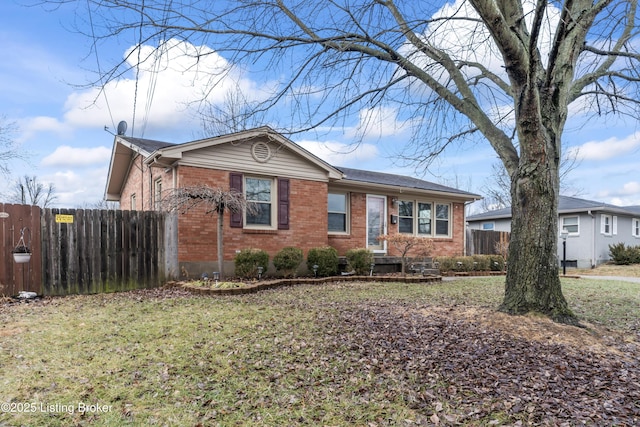 single story home featuring a front yard