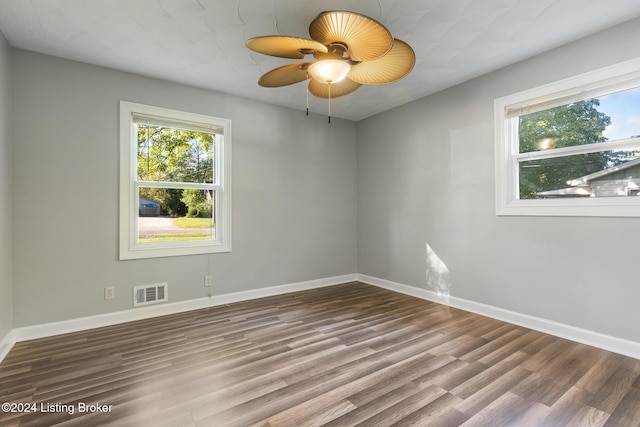 spare room with ceiling fan and hardwood / wood-style floors