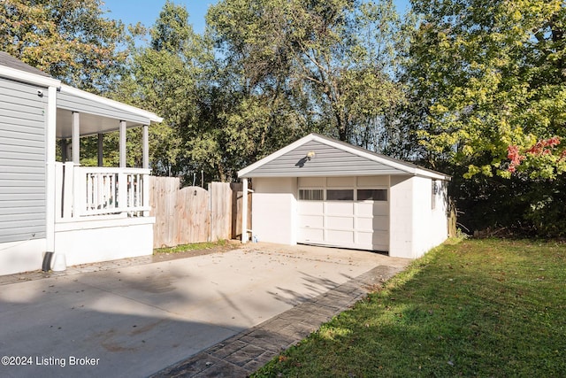 garage featuring a yard