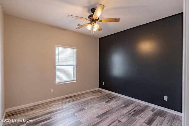 empty room with light wood-type flooring