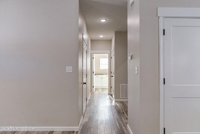 hall featuring wood-type flooring