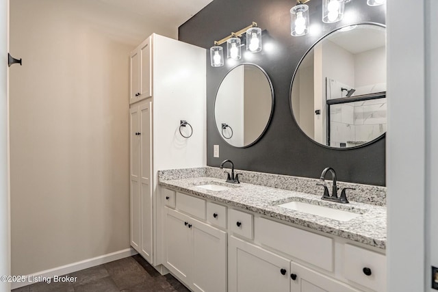 bathroom with vanity, tile patterned flooring, and a shower with shower door