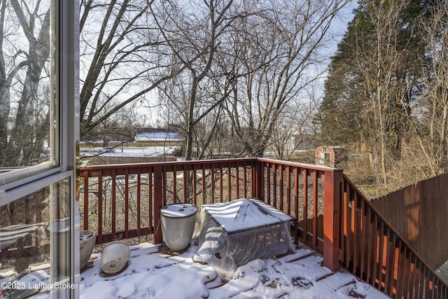 view of snow covered deck