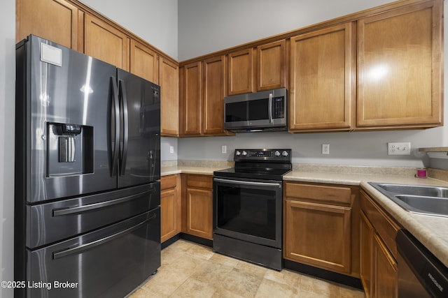 kitchen with sink and stainless steel appliances