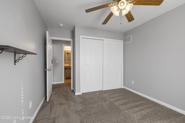 unfurnished bedroom with a closet, ceiling fan, and carpet flooring