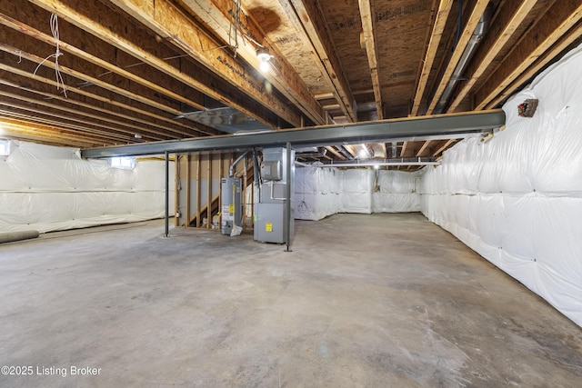 basement with heating unit and gas water heater