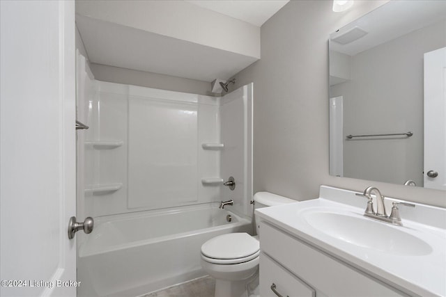 full bathroom with vanity,  shower combination, and toilet