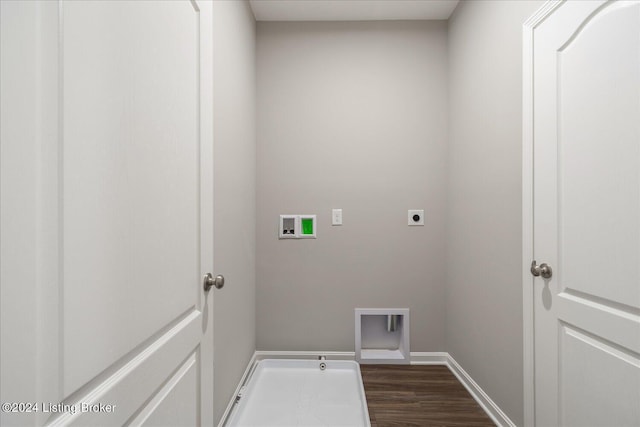 washroom featuring hookup for an electric dryer, dark wood-type flooring, and hookup for a washing machine