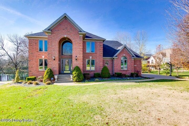 view of front of home with a front yard