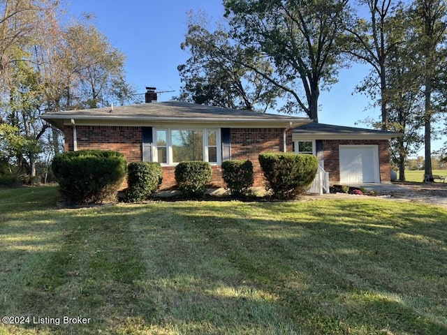 single story home featuring a front yard and a garage