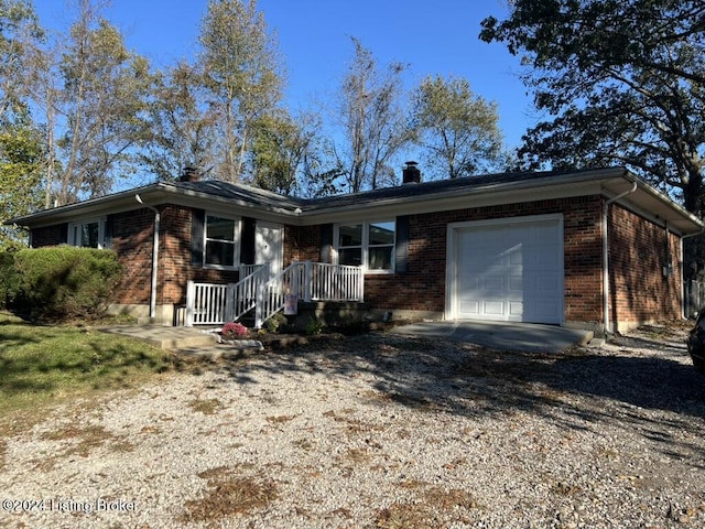 single story home featuring a garage