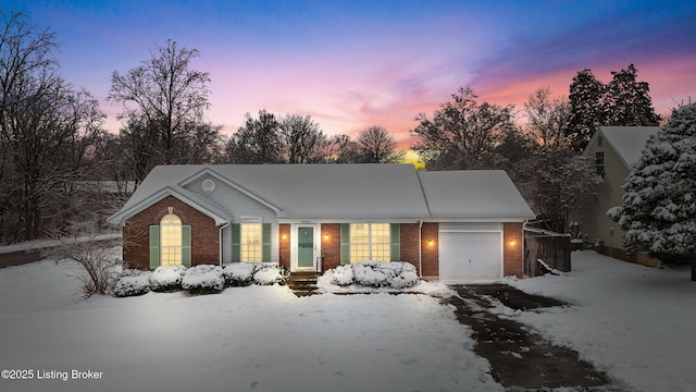 ranch-style house featuring a garage