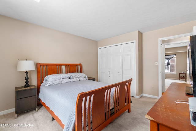 carpeted bedroom with a closet