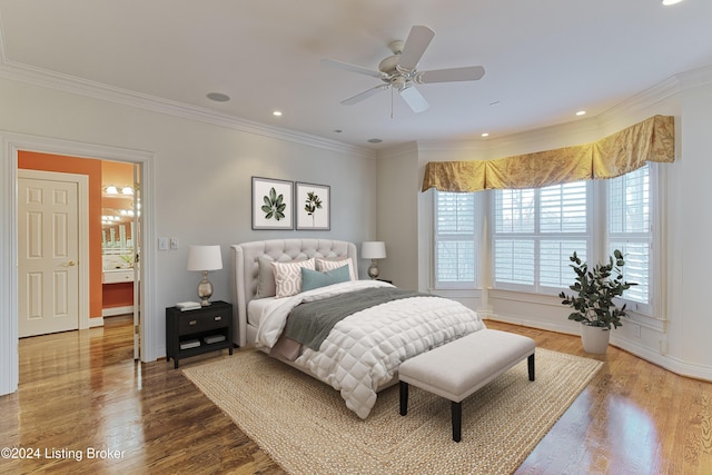 bedroom with ornamental molding, ceiling fan, and wood-type flooring