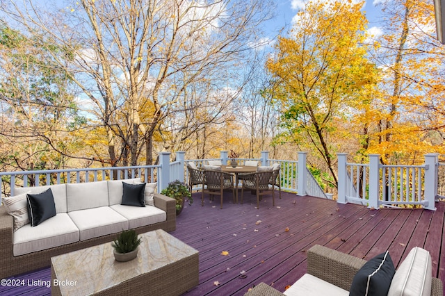 wooden deck featuring outdoor lounge area