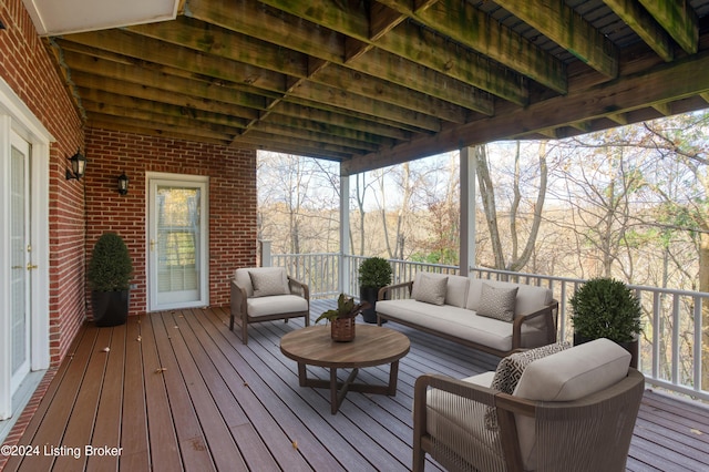 wooden deck featuring an outdoor hangout area