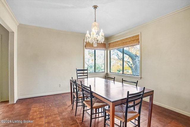 dining area featuring a chandelier, dark parquet flooring, and crown molding