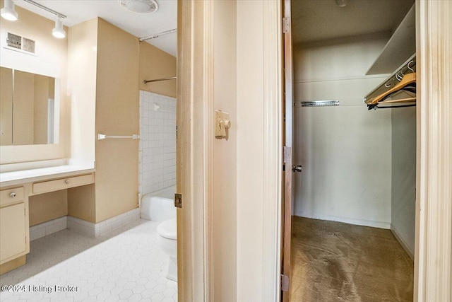 full bathroom featuring tile patterned flooring, vanity, toilet, and bathtub / shower combination