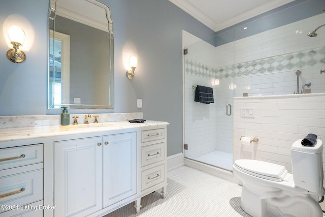 bathroom featuring vanity, crown molding, tile patterned flooring, toilet, and walk in shower