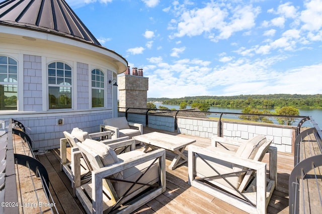 deck featuring a water view